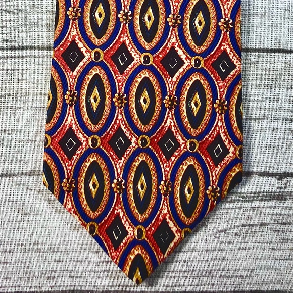 Vintage Burberrys Tie. Large colorful repeated oval and diamond design. EUC.